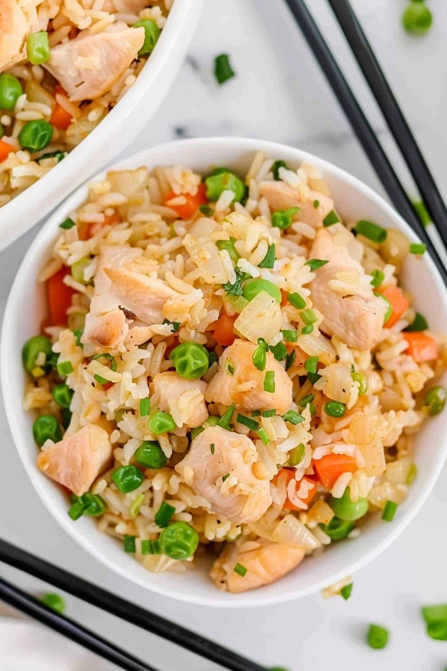Wok-Tossed Rice Dish: Savory, smoky perfection.